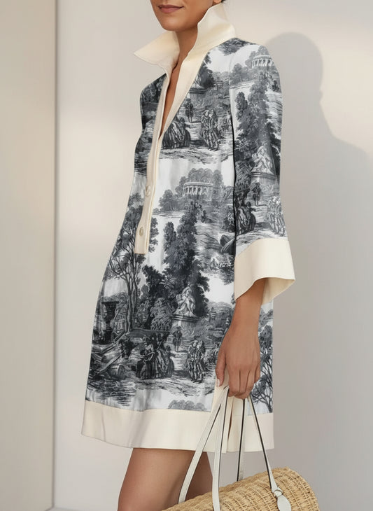 Person wearing a patterned dress with a white collar against a red background