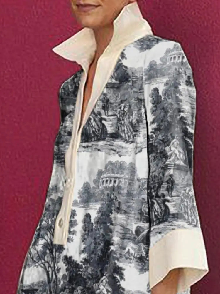 Person wearing a patterned shirt with a scenic design on a red background